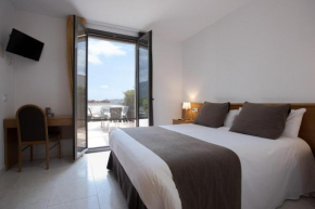 Отель Hotel Alta Garrotxa  Тортелья